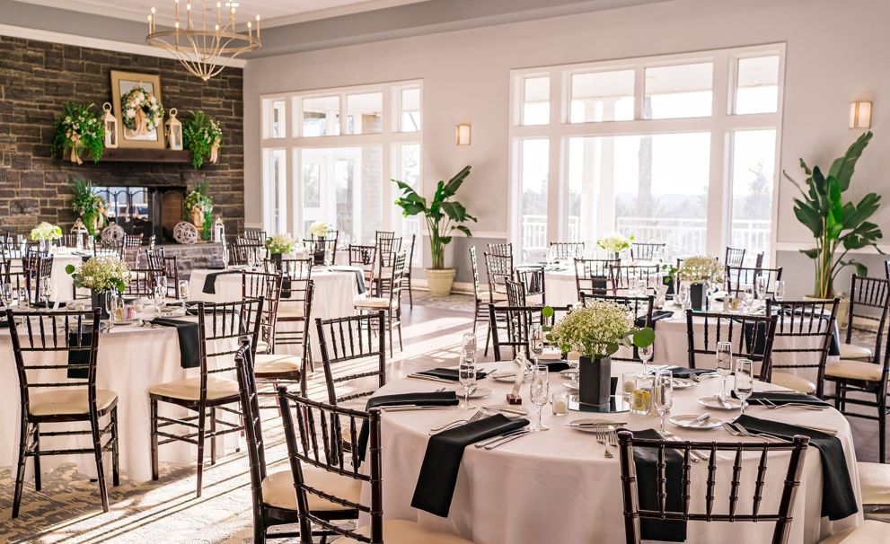 Tables set for wedding reception.