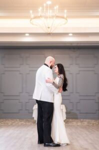 Bride and groom share their first dance.
