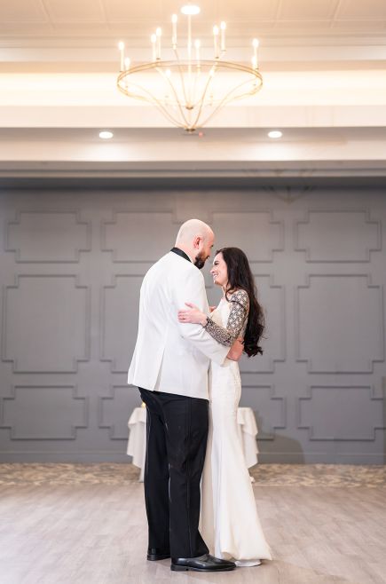 Bride and groom share their first dance.
