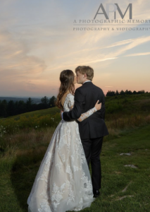 Bride and groom at sunset.