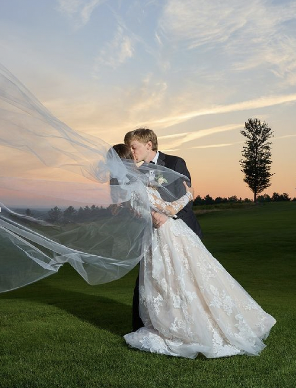 Bride and groom at sunset.