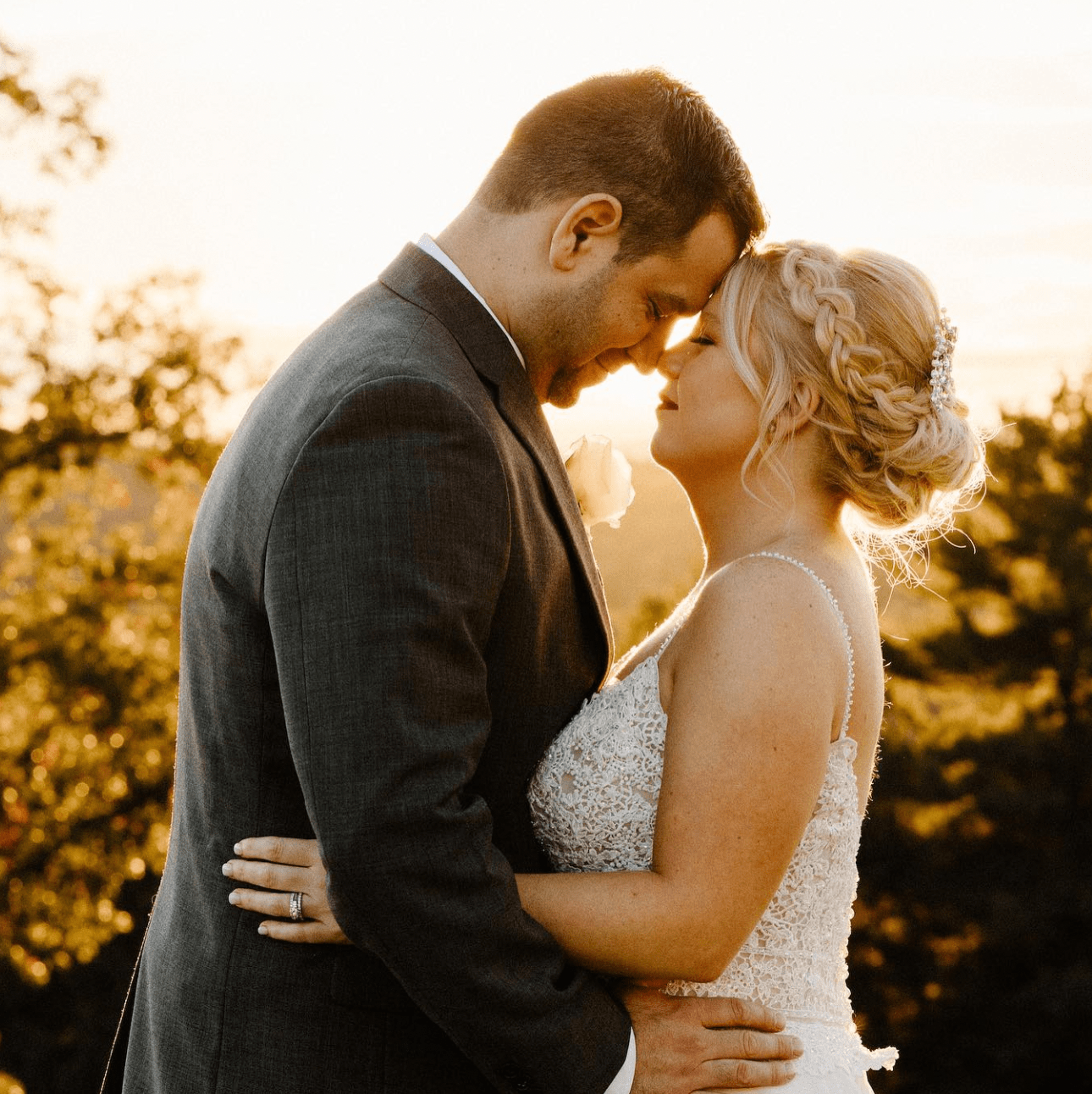 Bride and groom in the sunset.
