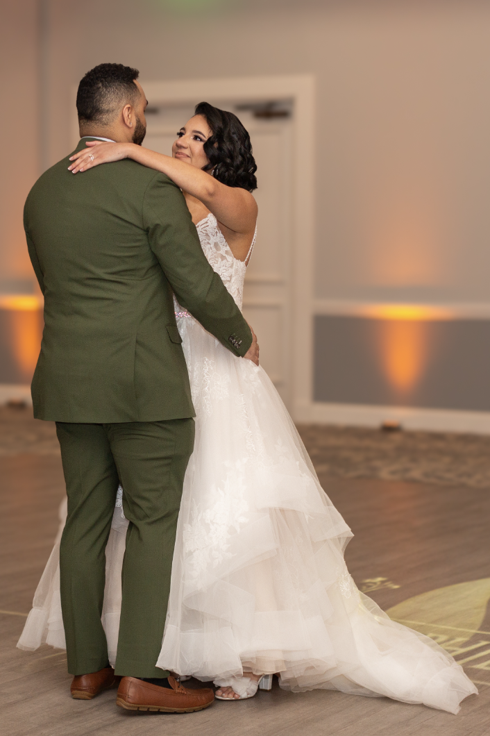 Bride and groom share their first dance.